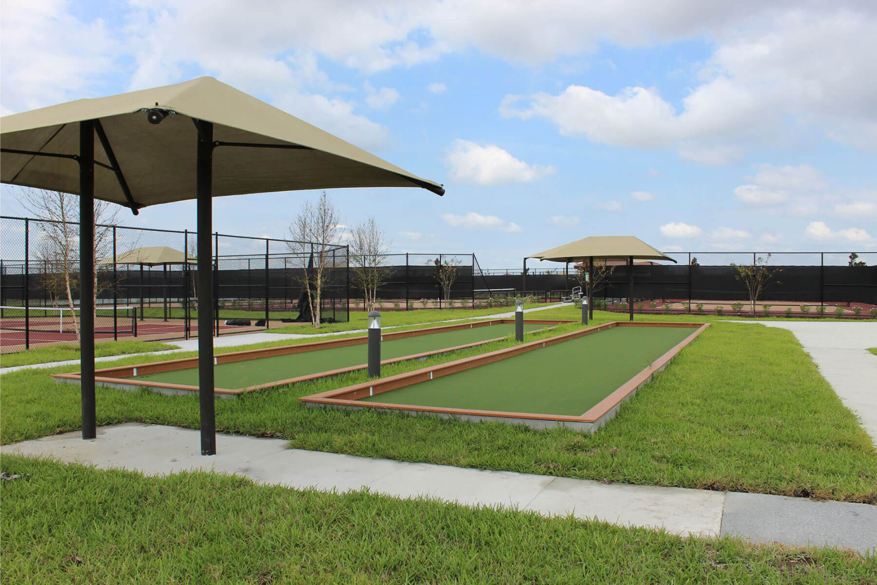 Outdoor pickle ball, tennis and bocce ball courts